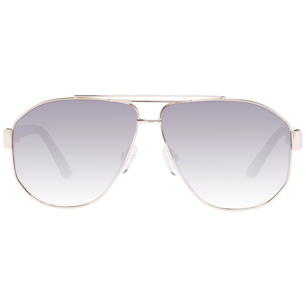 Sunglasses by Guess for women in and gold presents a sumptuous silhouette, featuring gold coloured frame and aviator full-rim frame design with gradient category-2-medium-tint lens for a sumptuous look.