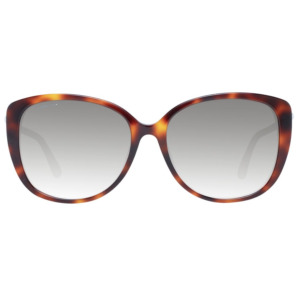 This Sunglasses by Jimmy Choo for women in gradient, brown, gray & multicolor presents a sumptuous silhouette, showcasing a sumptuous butterfly full-rim frame design in brown coloured frame and high-performance category-3-dark-tint gradient lens.