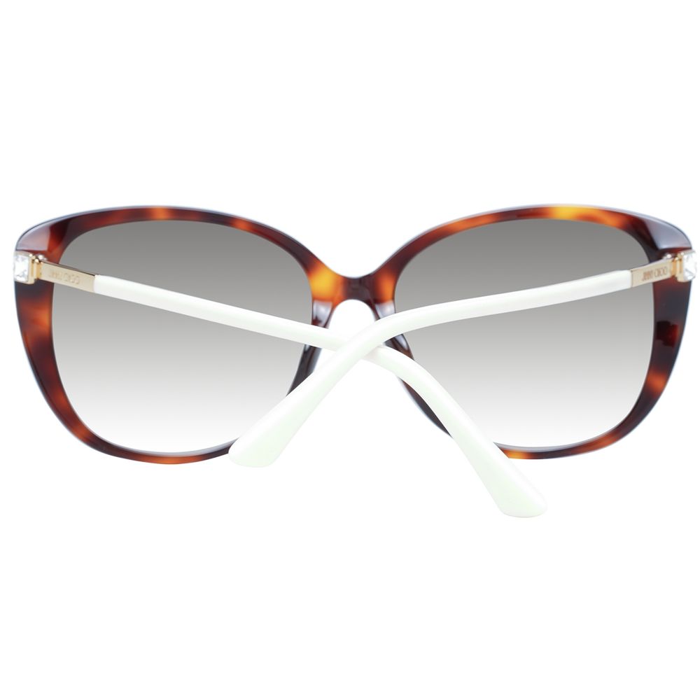 Sunglasses by Jimmy Choo for women in gradient, brown, gray & multicolor features an lustrous butterfly full-rim frame design with brown coloured frame detailing and category-3-dark-tint gradient lens for a lustrous aesthetic.