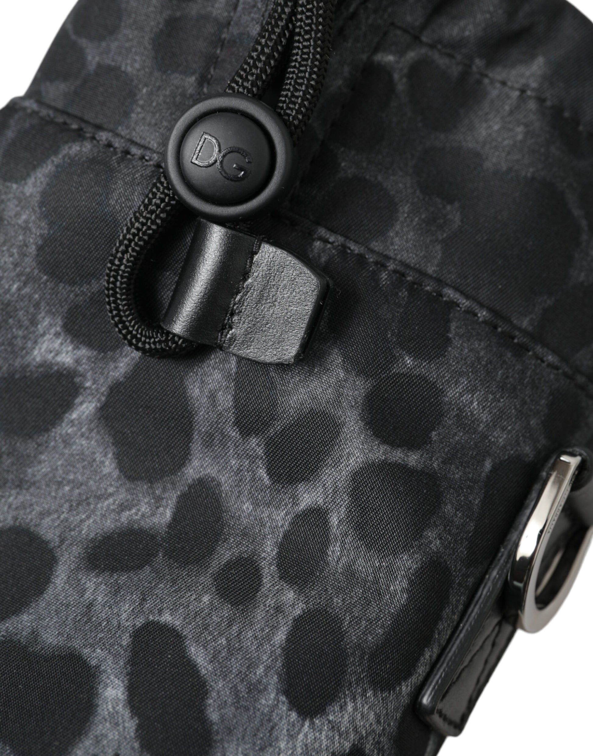 This Drawstring Tote Bag by Dolce & Gabbana for men in nylon & leather black, leopard-print & print features an jet-set Nylon Leather Drawstring Tote Bag design with a secure drawstring, ample , and jet-set .