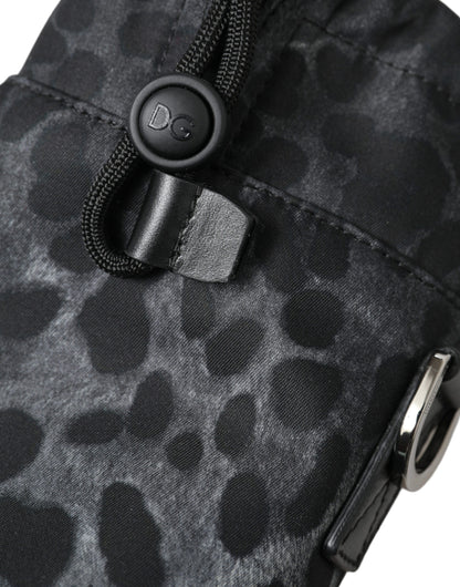 This Drawstring Tote Bag by Dolce & Gabbana for men in nylon & leather black, leopard-print & print features an jet-set Nylon Leather Drawstring Tote Bag design with a secure drawstring, ample , and jet-set .