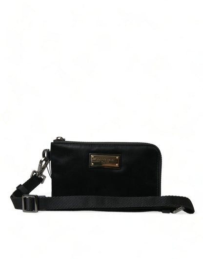 Compact Pouch Clutch Handbag by Dolce & Gabbana for women in calfskin leather & nylon black & silver showcases a sculptural silhouette, featuring a secure zipper, ample , and versatile detachable-strap for a sculptural finish.