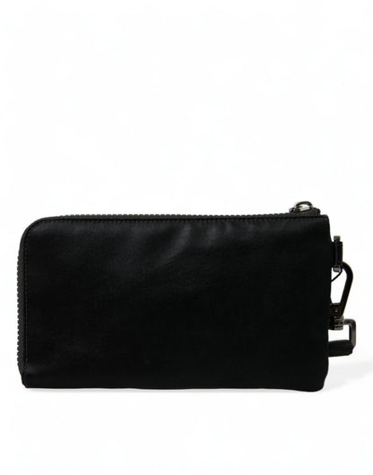 Compact Pouch Clutch Handbag by Dolce & Gabbana for women in calfskin leather & nylon black & silver features an sculptural silhouette, showcasing a secure zipper and sculptural with versatile detachable-strap for a sophisticated look.