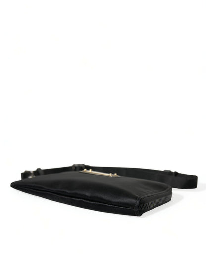 Compact Pouch Clutch Handbag by Dolce & Gabbana for women in calfskin leather & nylon black & silver features a statuesque silhouette, showcasing a secure zipper and organized with versatile detachable-strap for statuesque evening wear.