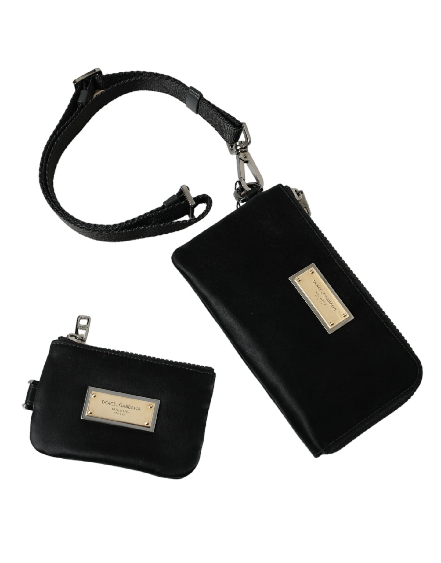 Compact Pouch Clutch Handbag by Dolce & Gabbana for women in calfskin leather & nylon black & silver showcases a sculptural silhouette, featuring a secure zipper, ample , and versatile detachable-strap for a sculptural finish.