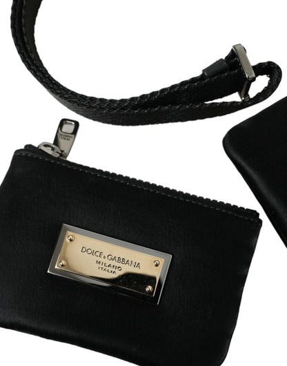 Compact Pouch Clutch Handbag by Dolce & Gabbana for women in calfskin leather & nylon black & silver features a sculptural silhouette with a secure zipper, organized , and versatile detachable-strap for a sculptural finish.