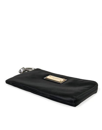Pouch Clutch Handbag by Dolce & Gabbana for men in calfskin leather & nylon black, gold & silver showcases a sculptural silhouette, featuring a secure zipper, ample , and versatile for a sculptural aesthetic.