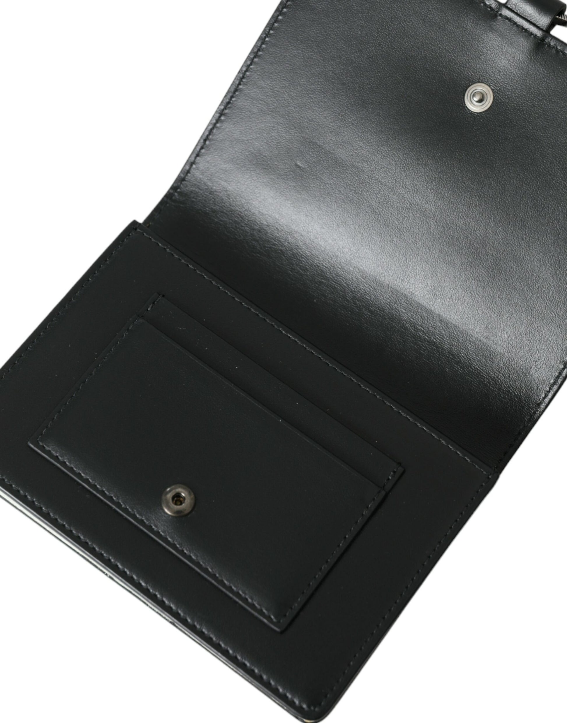 Cardholder Wallet by Dolce & Gabbana for women in brass crystal & calf leather black, silver & white presents a architectural silhouette from the Brass Crystal Calf Leather Cardholder Wallet collection, showcasing architectural card-organization compact-design for a architectural finish.