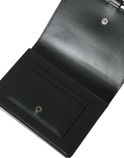 Cardholder Wallet by Dolce & Gabbana for women in brass crystal & calf leather black, silver & white presents a architectural silhouette from the Brass Crystal Calf Leather Cardholder Wallet collection, showcasing architectural card-organization compact-design for a architectural finish.
