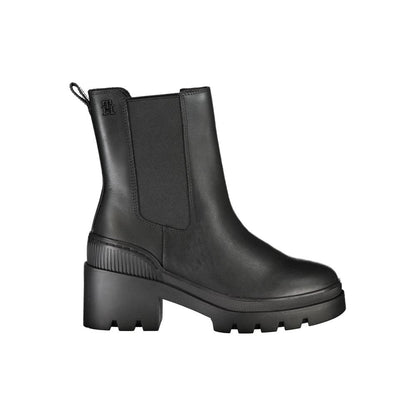 Mid-Heel Ankle Boots by Tommy Hilfiger for women in polyester polyethylene leather black features an high-performance silhouette, showcasing the sophisticated design of the Women's Polyester Polyethylene Leather Mid-Heel Ankle Boots with a 6-cm-heel mid-heel and a refined .