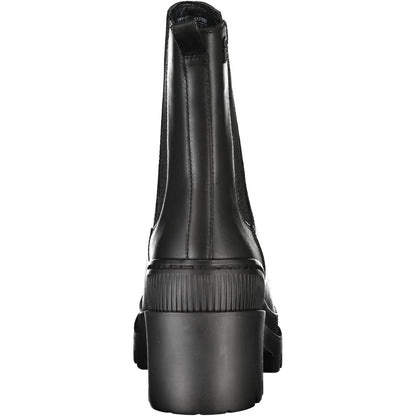 Mid-Heel Ankle Boots by Tommy Hilfiger for women in polyester polyethylene leather black showcases a ergonomic silhouette from the Women's Polyester Polyethylene Leather Mid-Heel Ankle Boots collection, featuring a ergonomic 6-cm-heel mid-heel and a ergonomic .