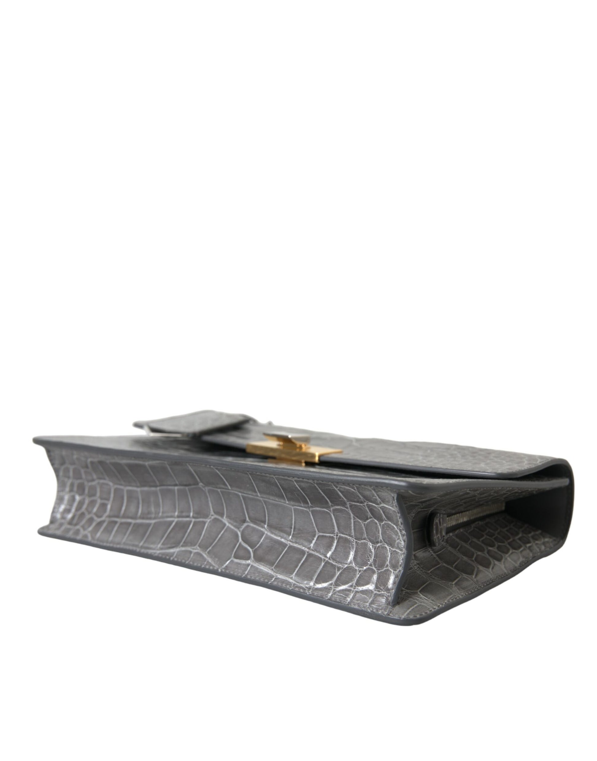 Medium Shoulder Bag by Balenciaga for women in alligator skin leather gray features a stately silhouette, showcasing a secure magnetic, ample , and stately shoulder-strap, adjustable-strap, detachable-strap & handle for a stately finish.