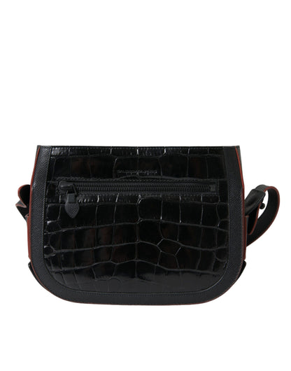 Compact Camera Crossbody Handbag by Balenciaga for women in croc skin leather black features a versatile chic silhouette, meticulously detailed with a secure snap & button, ample , and versatile crossbody-strap, shoulder-strap & adjustable-strap.