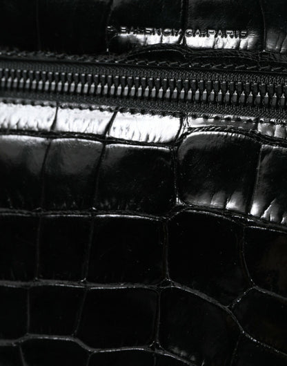 Compact Camera Crossbody Handbag by Balenciaga for women in croc skin leather black features a transformative sophistication silhouette, showcasing a secure snap & button, ample , and versatile crossbody-strap, shoulder-strap & adjustable-strap for a transformative sophistication look.