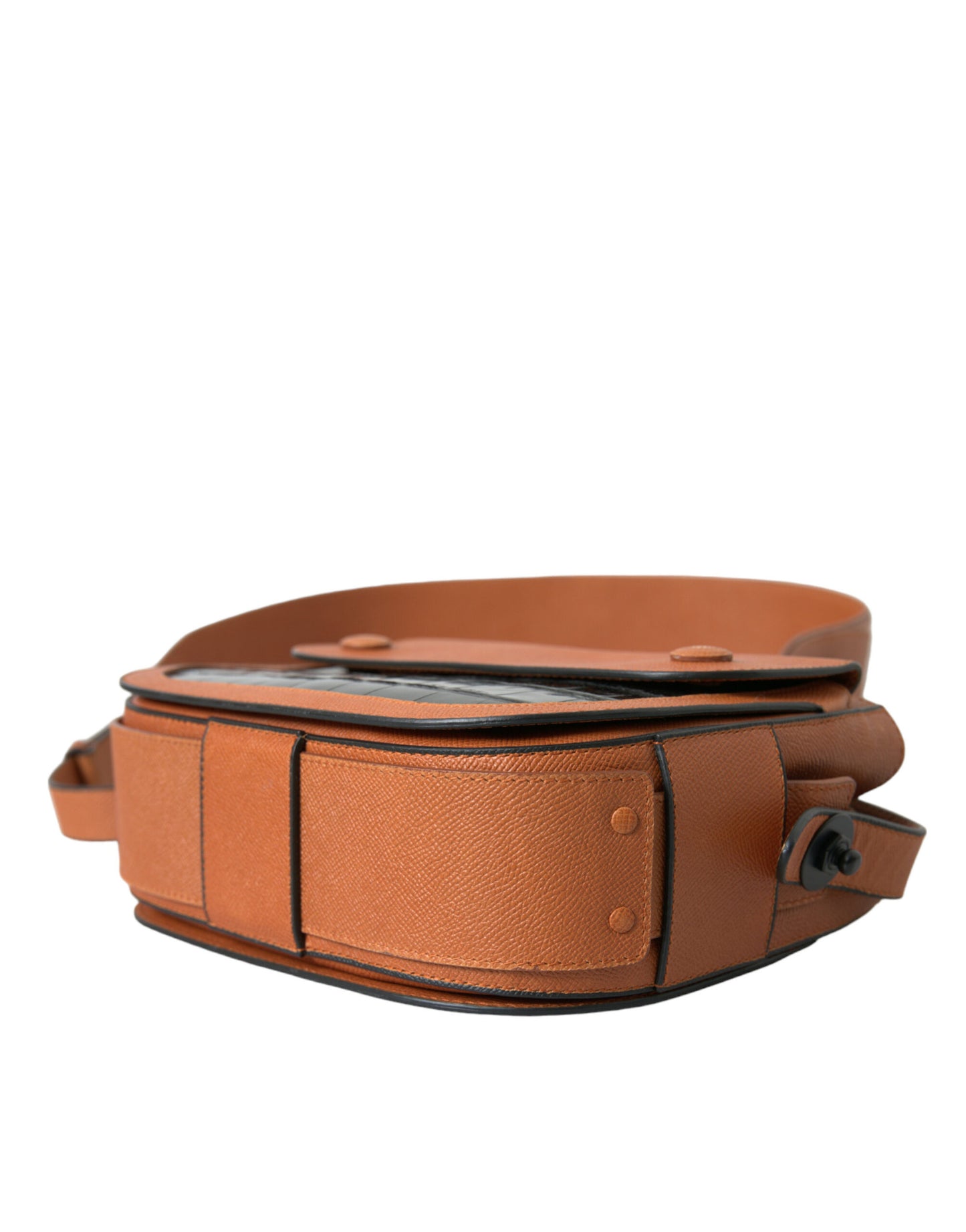 Compact Shoulder Camera Bag by Balenciaga for women in crocodile skin leather black & brown presents a statuesque silhouette, showcasing a secure snap & button and statuesque with versatile shoulder-strap & adjustable-strap for a sophisticated look.