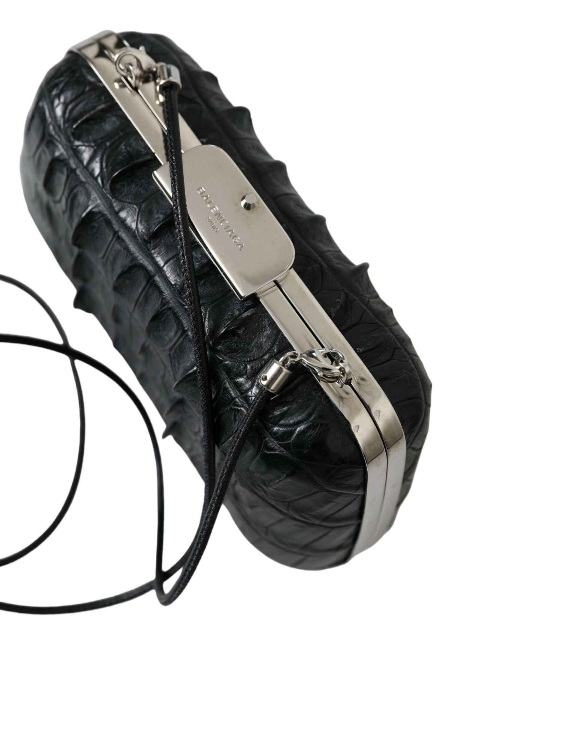 Compact 2-in-1 Shoulder & Crossbody Evening Clutch Convertible Handbag by Balenciaga for women in exotic skin leather black & silver features an exquisite silhouette, showcasing a secure clasp, ample , and exquisite crossbody-strap, shoulder-strap & detachable-strap for a sophisticated finish.