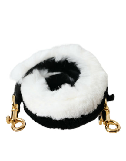 Shoulder Strap by Dolce & Gabbana for unisex in fur black, gold & white features a chic design, presenting a refined view of the Fur Shoulder Strap with a chic finish.