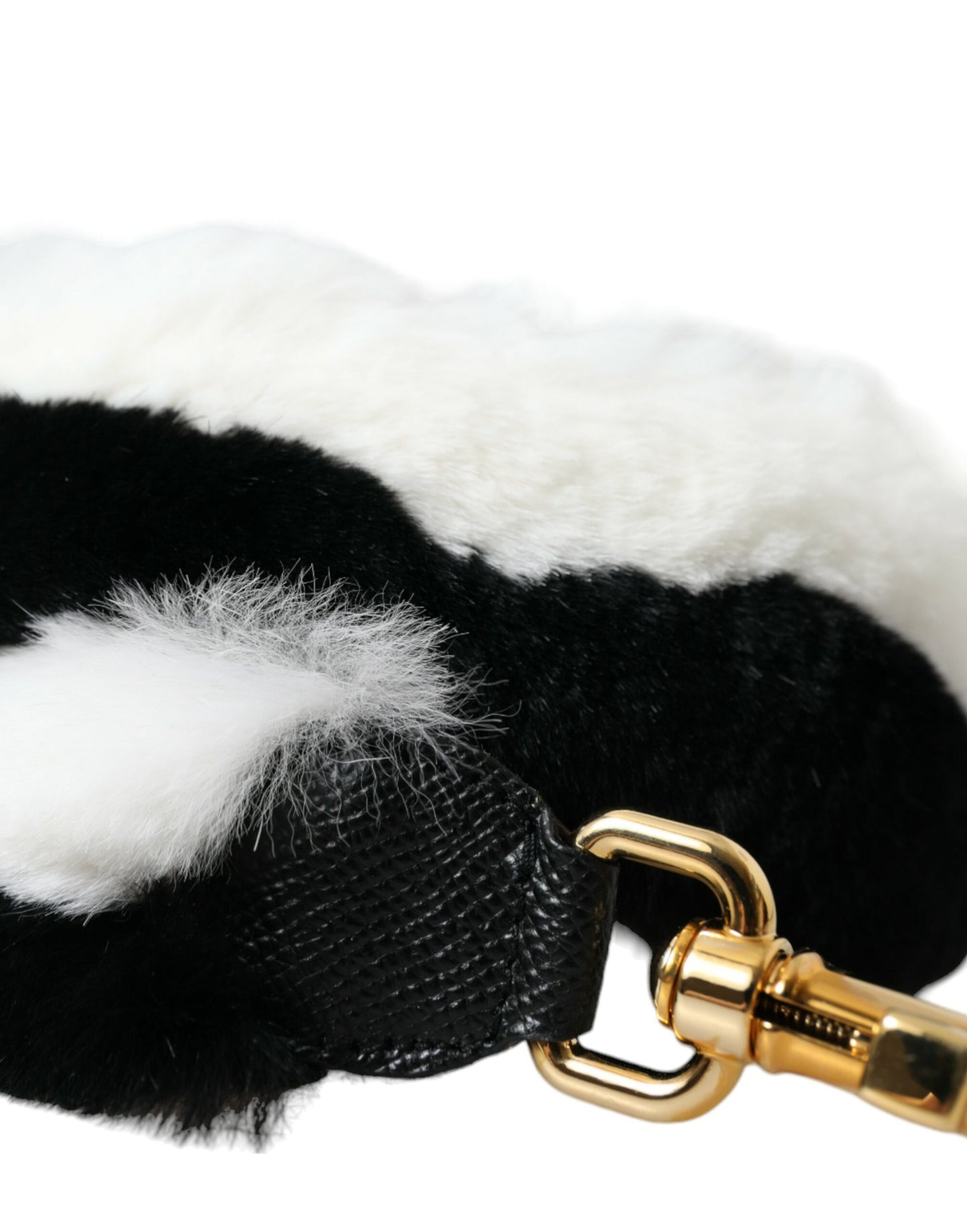 Shoulder Strap by Dolce & Gabbana for unisex in fur black, gold & white features an stylish design, beautifully completing the signature look of the Fur Shoulder Strap.