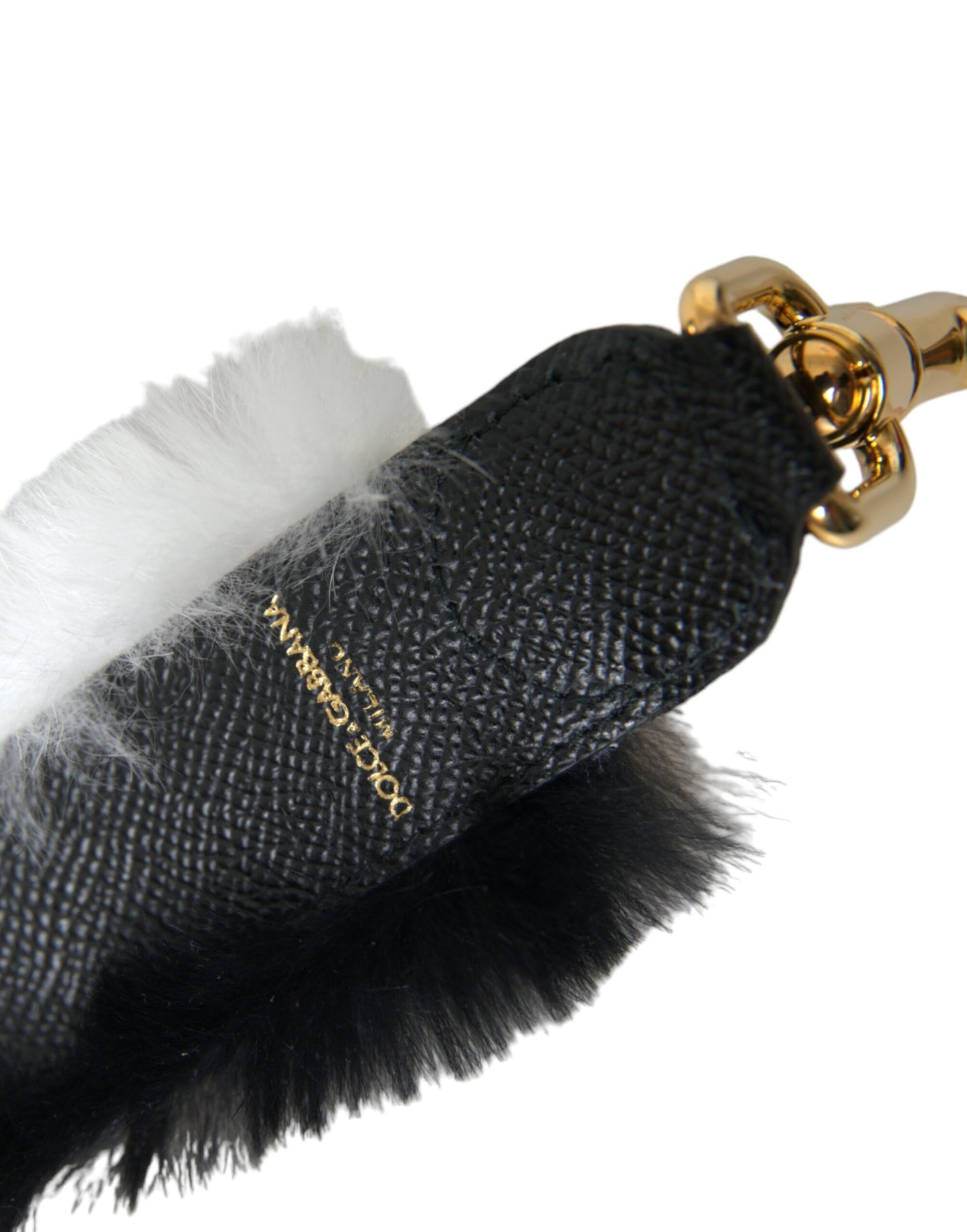 Shoulder Strap by Dolce & Gabbana for unisex in fur black, gold & white features a effortlessly chic design, perfectly complementing the signature look of the Fur Shoulder Strap.