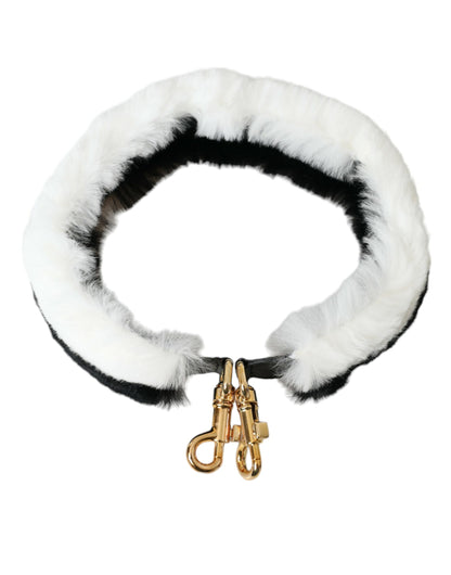 Shoulder Strap by Dolce & Gabbana for unisex in fur black, gold & white features a dynamic silhouette, artfully enhancing the dynamic design of this Fur Shoulder Strap.