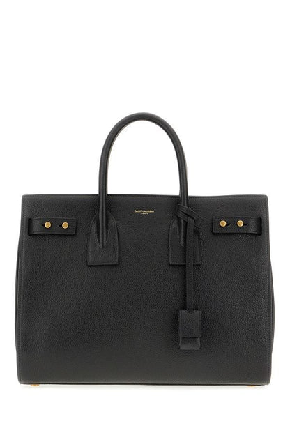 Box Handbag by Saint Laurent for women in pebbled calf leather black & print features a ornamental silhouette, showcasing a secure zipper, ample built-in-compartments, and ornamental shoulder-strap, adjustable-strap, detachable-strap & handle for a sophisticated look.