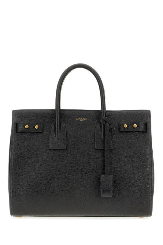 Box Handbag by Saint Laurent for women in pebbled calf leather black & print features a ornamental silhouette, showcasing a secure zipper, ample built-in-compartments, and ornamental shoulder-strap, adjustable-strap, detachable-strap & handle for a sophisticated look.