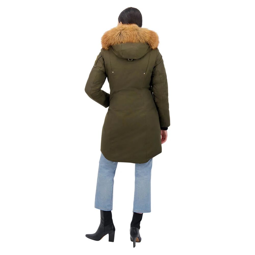 This Hooded Parka by Moose Knuckles for women in cotton nylon & fox fur military-green, blue & gold presents a utilitarian silhouette, meticulously detailed with hooded and a utilitarian hooded neckline for a sophisticated, weather-ready look.