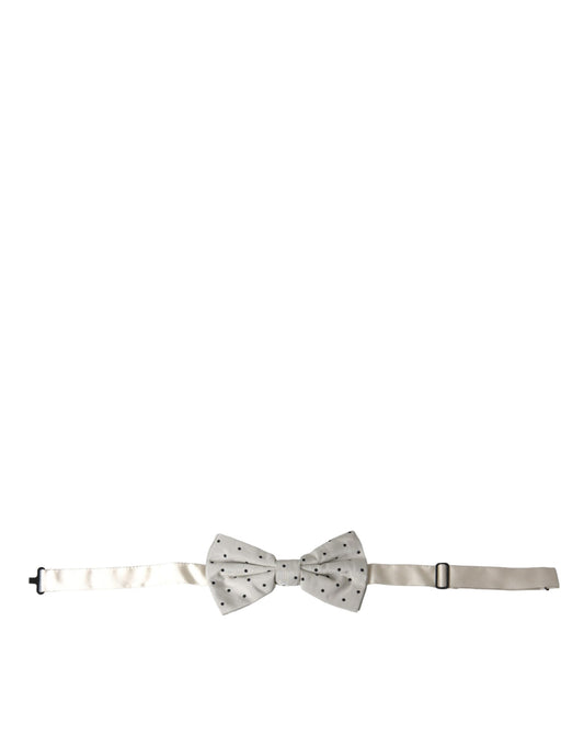Necktie by Dolce & Gabbana for men in polyester black & white features a sun-drenched silhouette, showcasing the sun-drenched design of this Polyester Necktie with a sun-drenched finish.