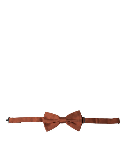 This Necktie by Dolce & Gabbana for men in silk brown presents a effortless chic silhouette from the Silk Necktie collection, offering a effortless chic finish for a truly effortless chic look.
