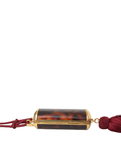 Mini Toiletry Bag by Dolce & Gabbana for women in leather & metal brown & gold features a distinguished Leather Metal Mini Toiletry Bag design with a secure clasp, organized , and versatile for travel.