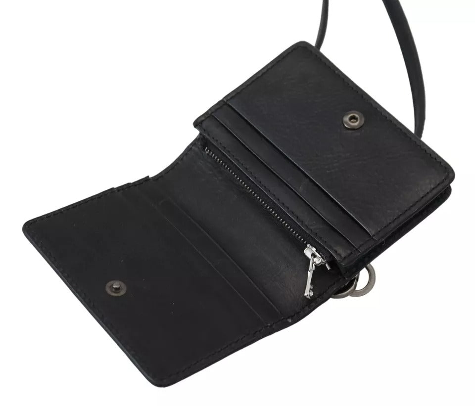 Wallet by Dolce & Gabbana for women in leather & metal black & silver showcases a refined silhouette, artfully detailed with the signature style of the Leather Metal Wallet and functional compact-design bifold.