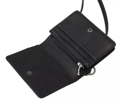 Wallet by Dolce & Gabbana for women in leather & metal black & silver showcases a refined silhouette, artfully detailed with the signature style of the Leather Metal Wallet and functional compact-design bifold.