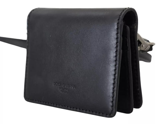 Wallet by Dolce & Gabbana for women in leather & metal black & silver showcases a refined silhouette, artfully capturing the essence of the refined Leather Metal Wallet design with functional compact-design bifold.