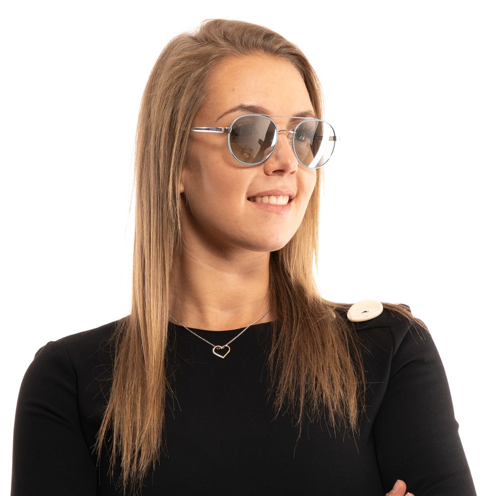 Sunglasses by Guess for women in turquoise features a sumptuous silhouette, showcasing a sumptuous aviator full-rim frame design in turquoise coloured frame with high-performance mirrored category-1-light-tint lens.