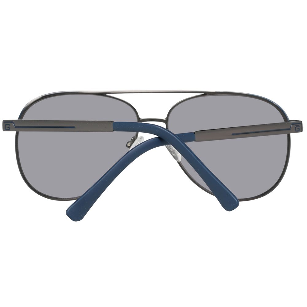 Sunglasses by Guess for men in and gray featuring an opulent aviator full-rim frame design with a sophisticated gunmetal coloured frame finish and high-performance mirrored category-3-dark-tint lens.