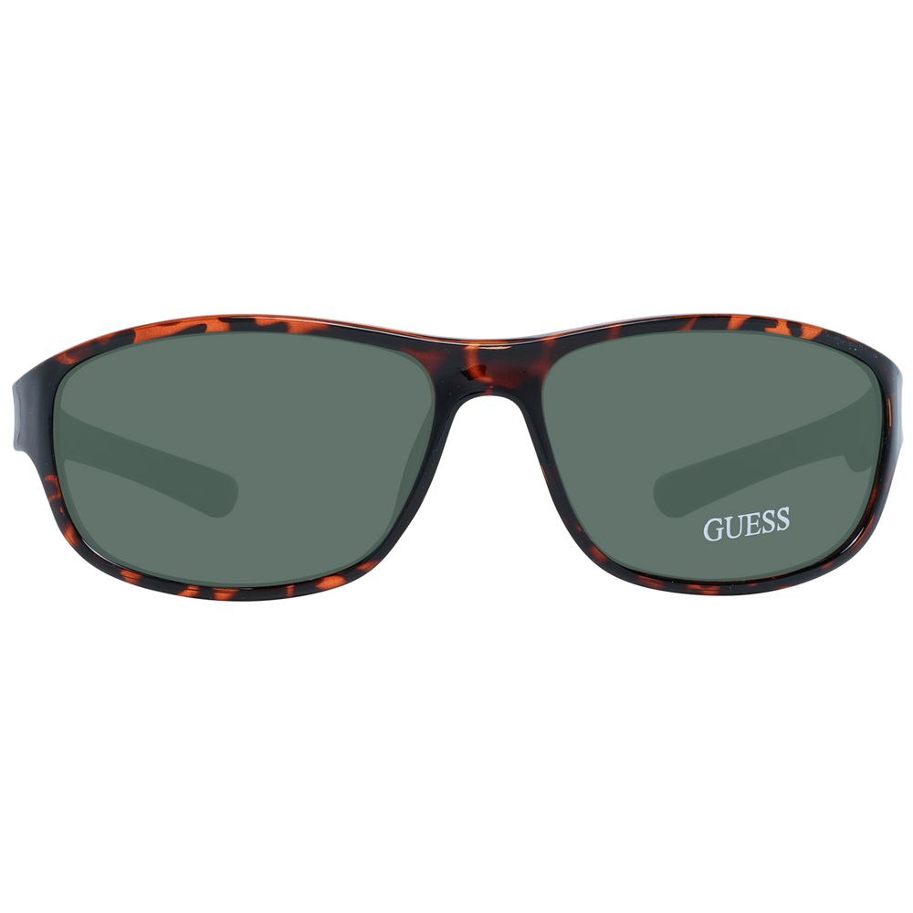 Sunglasses by Guess for unisex in brown showcases a ethereal silhouette, featuring brown coloured frame rectangle full-rim frame design with non-polarized category-3-dark-tint lens for a ethereal finish.