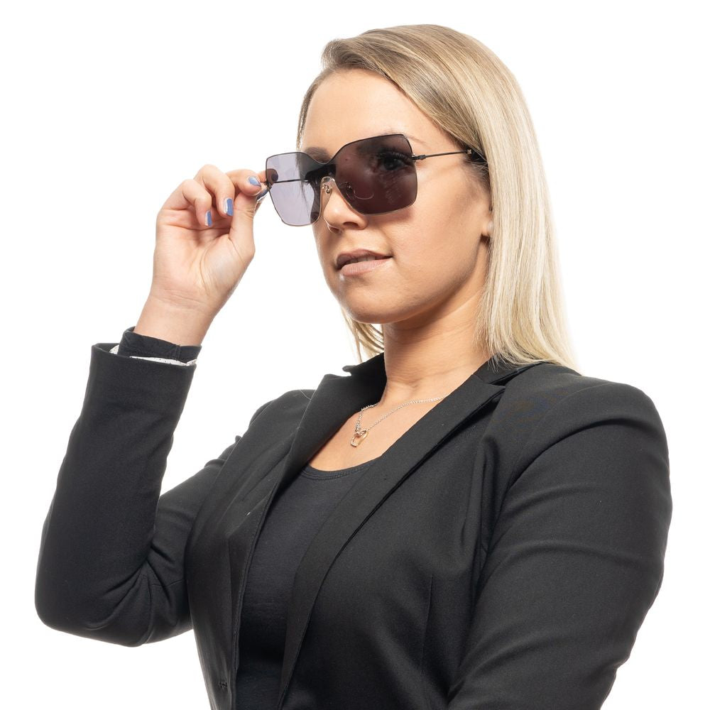 This Sunglasses by Carolina Herrera for women in black presents a sumptuous silhouette, showcasing a sumptuous full-rim mono-lens frame design in black coloured frame and high-performance non-polarized category-3-dark-tint lens.