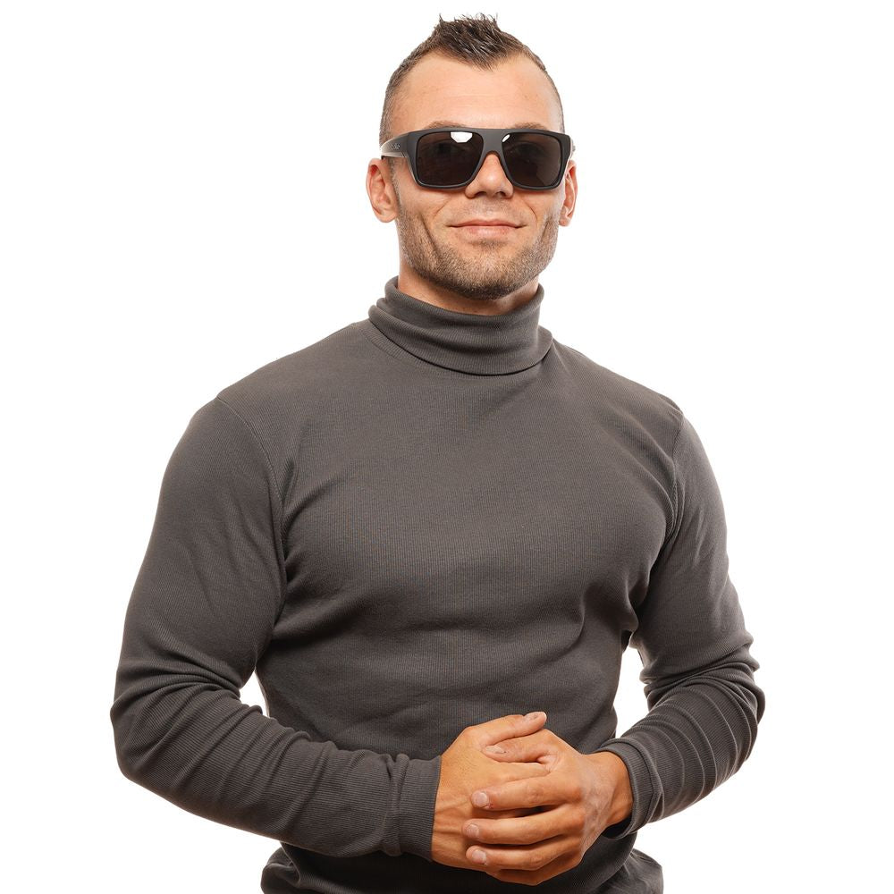 Sunglasses by Bolle for unisex in black showcases a ethereal silhouette, featuring black coloured frame rectangle full-rim frame design with polarized category-3-dark-tint lens for a ethereal finish.