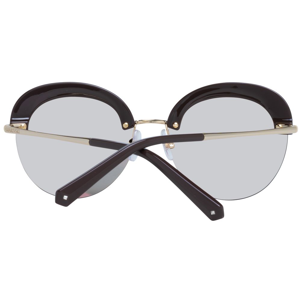 Sunglasses by Swarovski for women in gold features an ethereal half-rim round frame design with multicolor coloured frame frames and mirrored category-2-medium-tint lens for a ethereal finish.
