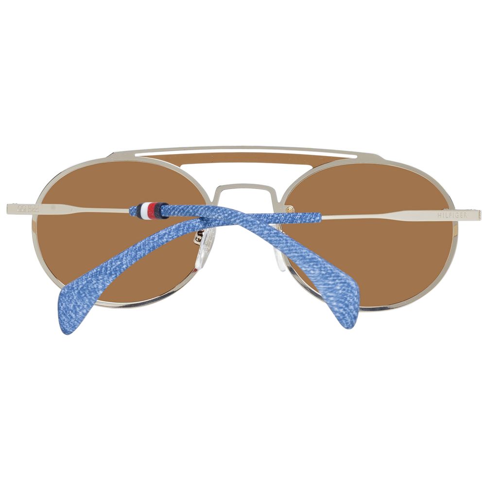 This Sunglasses by Tommy Hilfiger for women in metal gold presents a sumptuous silhouette, showcasing a sumptuous aviator full-rim frame design in gold coloured frame and high-performance non-polarized category-3-dark-tint lens.