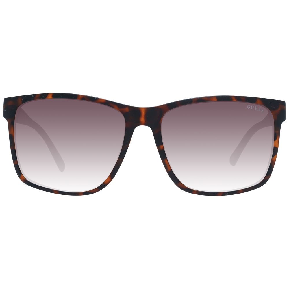 Sunglasses by Guess for men in and brown featuring an opulent full-rim square frame design with a sophisticated brown coloured frame finish and high-performance gradient category-3-dark-tint lens.