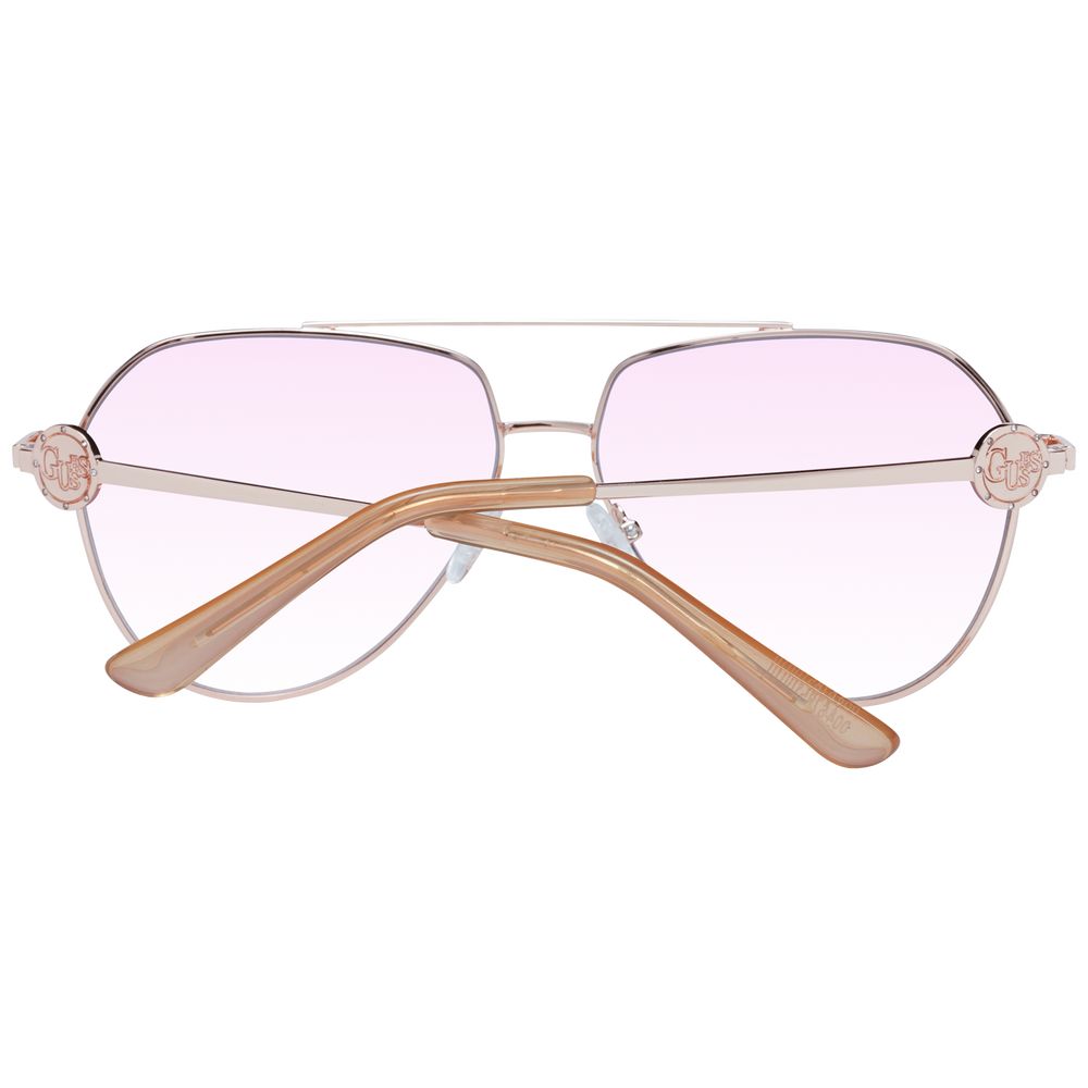 Sunglasses by Guess for women in rose-gold features an ethereal aviator full-rim frame design with rose-gold coloured frame frames and gradient category-2-medium-tint lens for a ethereal finish.