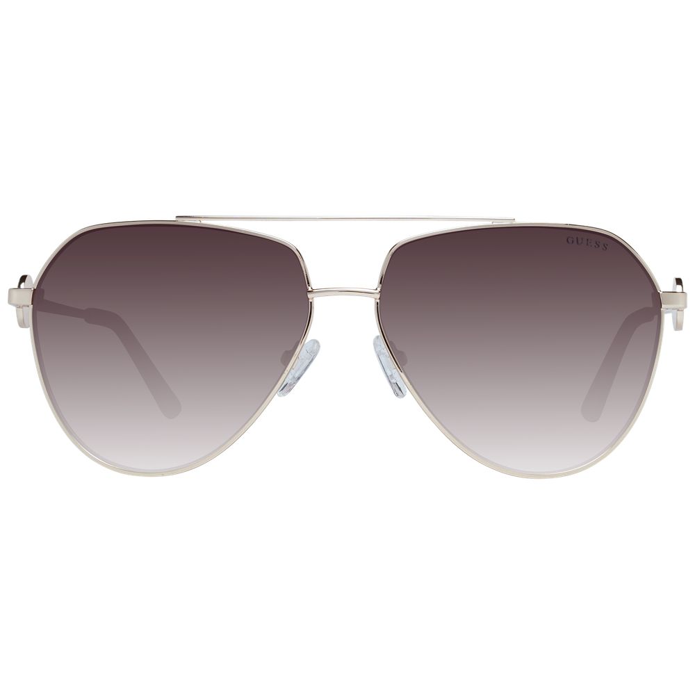 Sunglasses by Guess for women in and gold featuring an opulent aviator full-rim frame design with a sophisticated gold coloured frame finish and high-performance gradient category-3-dark-tint lens.