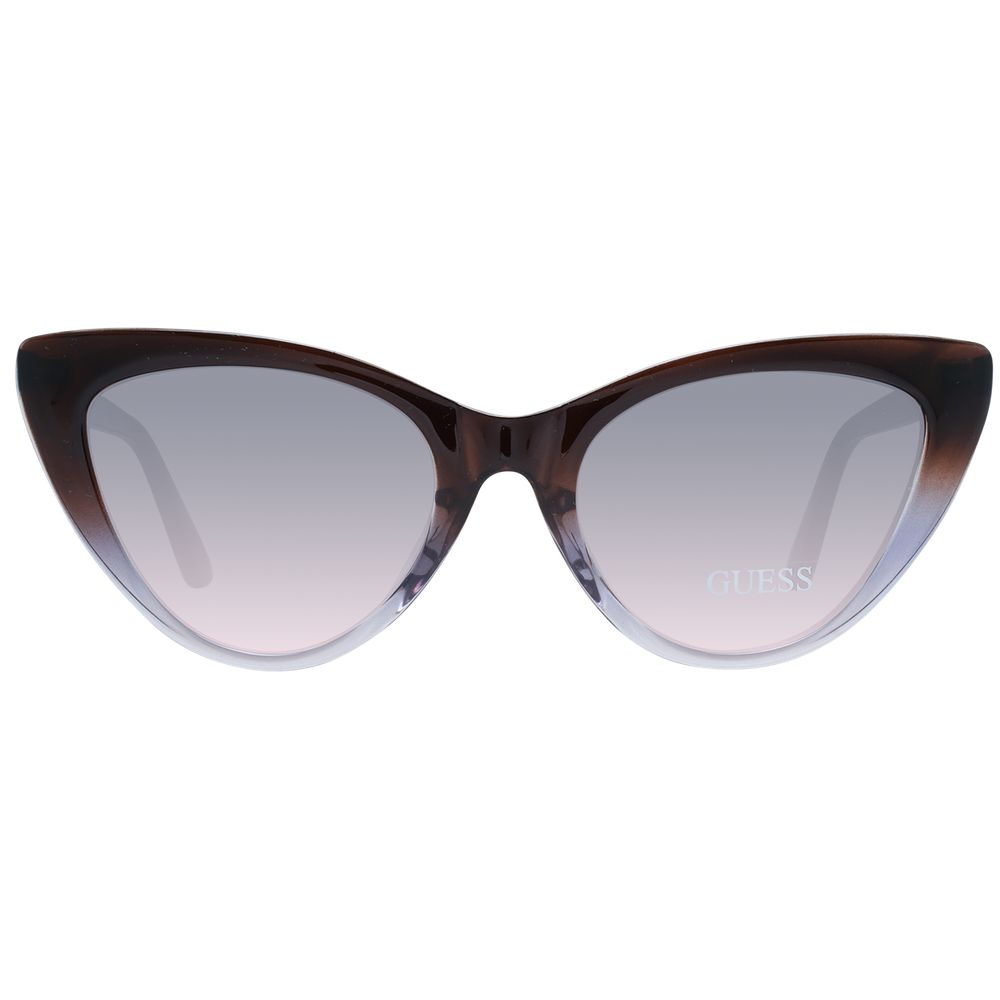Sunglasses by Guess for women in brown features a sumptuous silhouette, showcasing a sumptuous full-rim cat-eye frame design in brown coloured frame with high-performance gradient category-2-medium-tint lens.