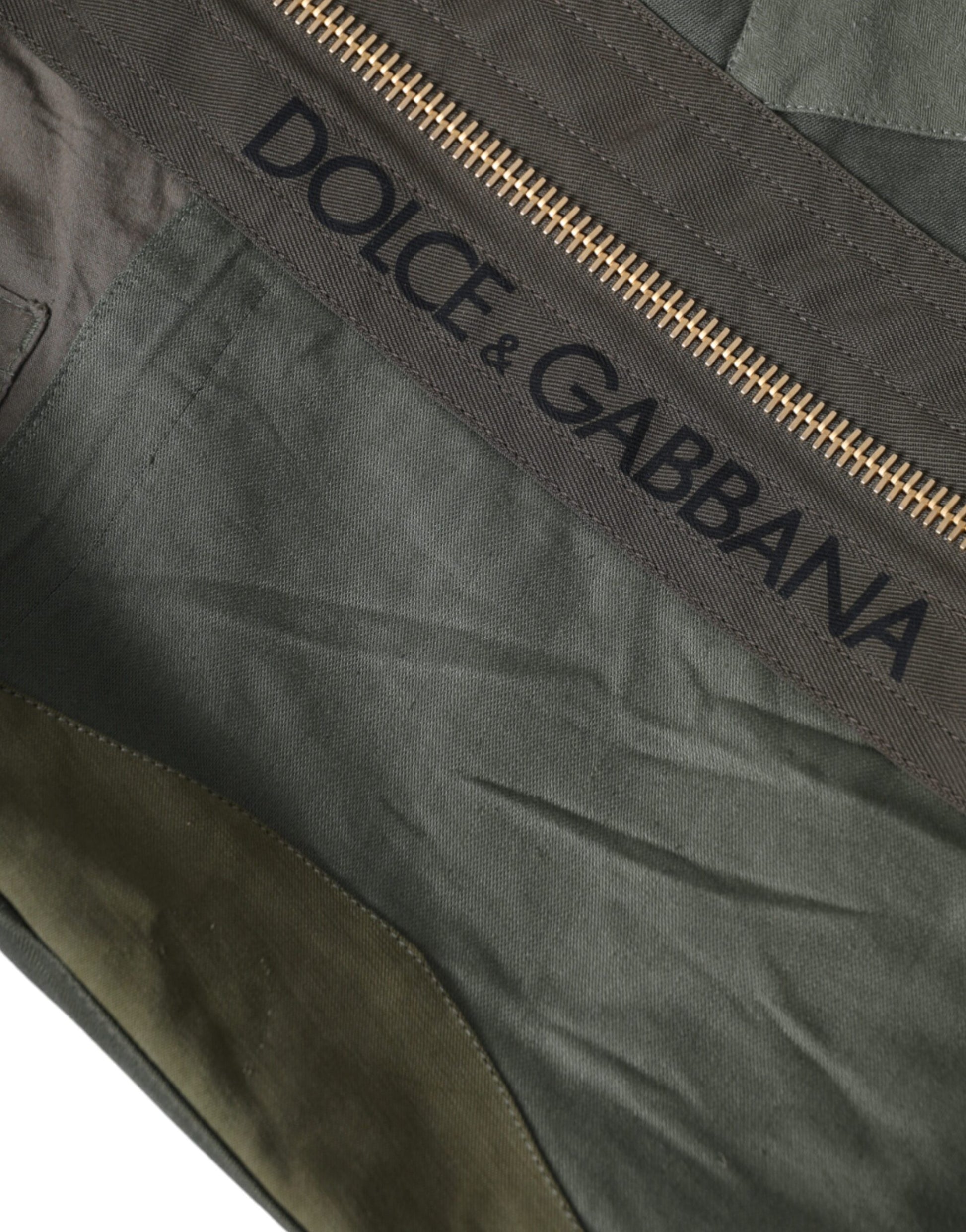 Large Drawstring Rucksack Backpack by Dolce & Gabbana for men in canvas military-green, camouflage & patchwork features a architectural Canvas Large Drawstring Rucksack Backpack design with a secure drawstring, ample internal-pockets, and versatile backpack-strap for a architectural finish.