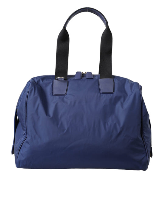 Travel Duffel Bag by Dolce & Gabbana for men in calfskin leather & nylon black & blue presents a refined Calfskin Leather Nylon Travel Duffel Bag design, showcasing a secure zipper and refined internal-pockets with versatile shoulder-strap, handle, adjustable-strap & detachable-strap.