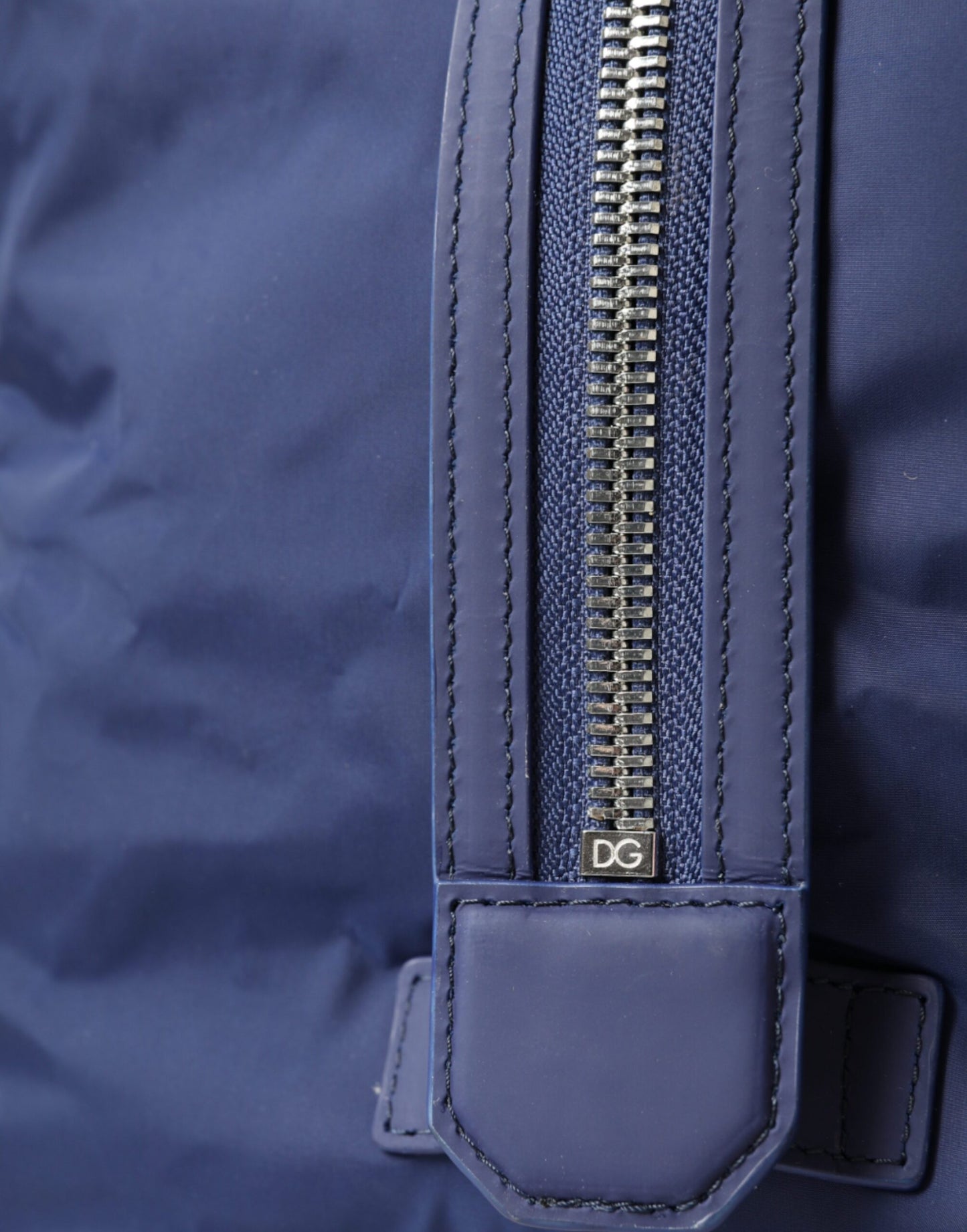 Travel Duffel Bag by Dolce & Gabbana for men in calfskin leather & nylon black & blue features a meticulous Calfskin Leather Nylon Travel Duffel Bag design with a secure zipper, ample internal-pockets, and versatile shoulder-strap, handle, adjustable-strap & detachable-strap for a meticulous travel finish.