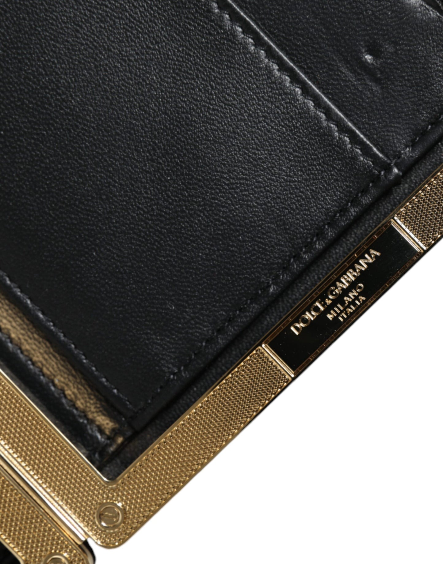Evening Box Clutch Convertible Handbag by Dolce & Gabbana for women in suede leather black, gold, multicolor, patterned & floral features an exquisite silhouette, showcasing a secure , ample cardholder, and versatile for exquisite style.