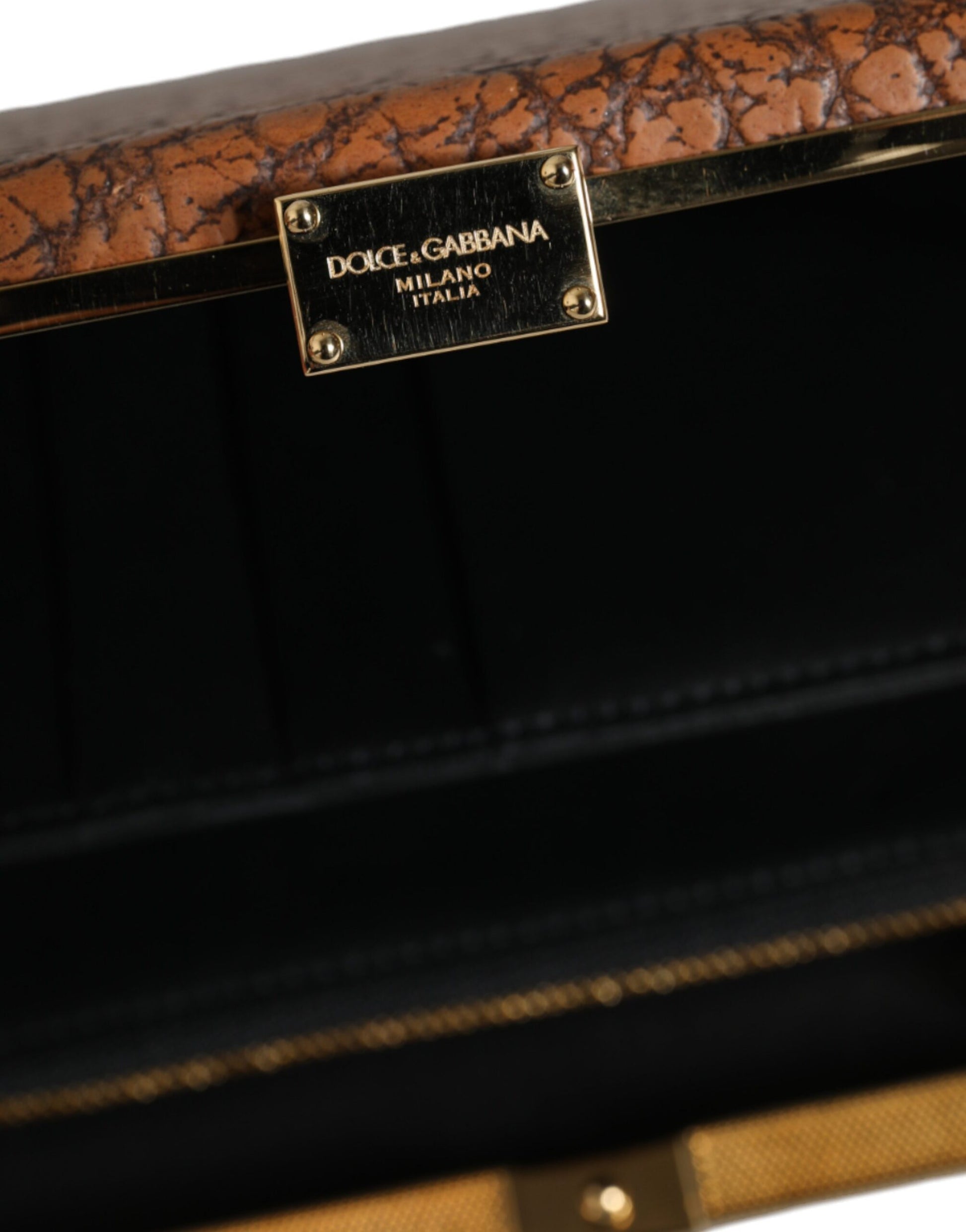 Micro Crossbody Box Clutch Convertible Handbag by Dolce & Gabbana for women in leather & brass black, brown & gold features an exquisite silhouette, showcasing a secure , ample cardholder, and versatile crossbody-strap & detachable-strap for exquisite style.