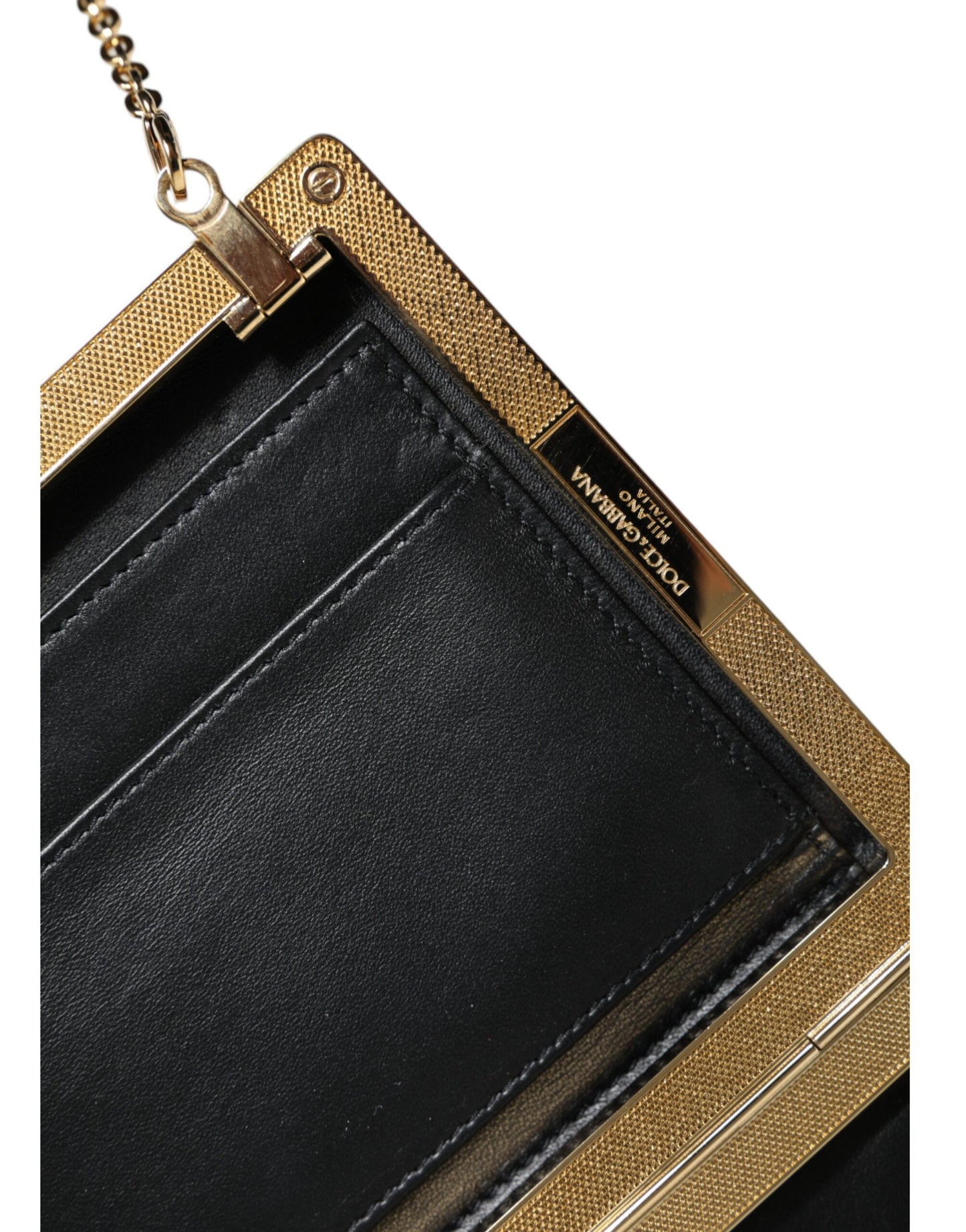 Micro Crossbody Box Clutch Convertible Handbag by Dolce & Gabbana for women in leather & brass black, brown & gold presents a exquisite silhouette, showcasing a secure and organized cardholder with versatile crossbody-strap & detachable-strap.